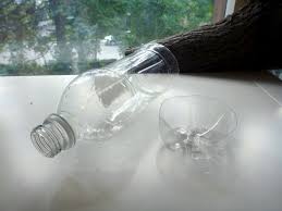 Instead of tossing used plastic bottles, hold onto them. How To Make A Hanging Planter With A Recycled Plastic Soda Bottle