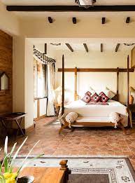 Each Of The Enormous Suites Are Furnished With Nepalese Antiques And Handcrafted Furniture Reflecting The Hotel S Long Hi Bedroom Design Bedroom Diy Home Deco