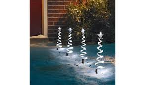 Shop our wide selection of outdoor christmas decorations including window decorations. Buy Argos Home Set Of 4 Christmas Tree Path Finder Lights White Outdoor Christmas Decorations Argos