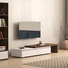Tv wall units come in a plethora of designs and shapes, depending upon what one needs or desires. Tv Units For Home Latest Tv Cabinet Designs Urban Ladder