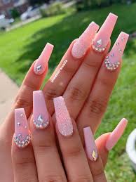 Although a lot of your nails are a simple and easy, marginal design, the iridescence is an impressive enhance to that selection. Beautiful Baby Pink Coffin Nails Long With Rhinestones And An Accent Nail Baby Pink Nails Bling Acrylic Nails Nails Design With Rhinestones
