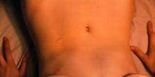 her laying on the bed underneath