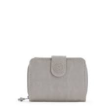 Due to its minimalist design, you will manage to carry it in your travel pack, purse or even pocket. New Money Small Credit Card Wallet Kipling