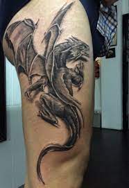 Leg is an uncommon place for dragon tattoos. 60 Dragon Tattoo Ideas To Copy To Live Your Fairytale Through Tattoos Dragon Tattoo Dragon Tattoos For Men Dragon Sleeve Tattoos