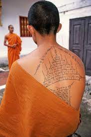 Grey ink buddhist tattoos design. Monk With Lao Tattoos Lao Tattoo Monk Tattoo Ideen Herz Ideen