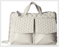 Gwen stefani's fashion line started as a collaboration with lesportsac back in 2003. Gwen Stefani Handbag Quilted Light Gray Large Designer Shoulder Bag Designer Handbag Shoulder Bag Gwen Stefani Gray Light Gray Grey Light Grey Bag Purse Neutral Large Wholesale Purses Wholesale Cowgirl Clothing