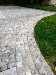 Reclaimed Belgian Porphyry Cobblestone Cubes Create This Useful And Elegant Swale Cobblestone Patio Driveway Landscaping Garden Paving