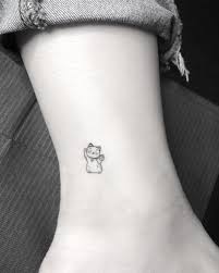 Lucky Cat Outline Tattoo 3 4 Inch Maneki Neko Evantattoo Evantattooinnyc Tattootrip F Minimalist Tattoo Cat Outline Tattoo Lucky Cat Tattoo