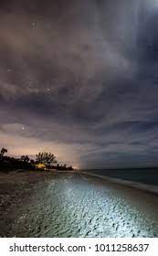 Maybe you would like to learn more about one of these? Moonlight Beach Scene Stock Photo Edit Now 1011258637