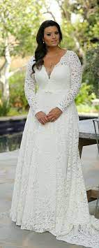 Plus Size Lace Wedding Dress With Long Sleeves And Slimming Interior Corset Seline Studio Levana Plus Size Wedding Gowns Top Wedding Dresses Wedding Dresses