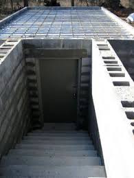 A traditional root cellar built with cinder blocks and a barrel filled with straw which is placed underground to store your vegetables in. 310 Root Cellar Ideas Root Cellar Cellar Root