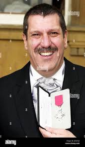 With his mbe at buckingham palace hi-res stock photography and images