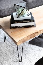 To build a coffee table, start by cutting 2 long wooden boards and 3 short boards. My Diy Wood Slab Coffee Table I Spy Diy