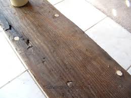 You have probably seen a lot of fireplaces built without mantels and with a clean front face to them above the firebox. Easy Faux Railroad Tie Mantel Scavenger Chic