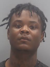 Two men arrested for shooting death of woman