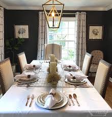 A grid of photographs by doug and mike starn is mounted above the fireplace, and the playful ceiling light is. Dark Gray Painted Walls And The Galway House Jennifer Rizzo