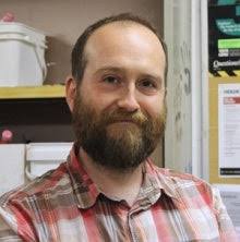 Adam Glover receives a 2023 Arts Award for Excellence in Service.