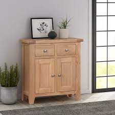 Ideal for hallways where their narrow proportions come into their own, a console table can fulfil several functions. This Light Oak Extra Small Sideboard Is From The Harwick Oak Range