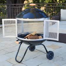 Backyard fire pits are a great addition to any outdoor living space. Corvus Aviano Black Enamel Finished Wheeled Fire Pit Overstock 8454740