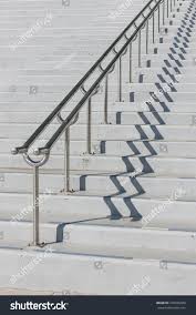 Leave about 3/4 of an inch of the threaded portion sticking up where the post centers will be. The Concrete Stair And Handrail Banister Shadow Royalty Free Stock Photo 376926040 Avopix Com
