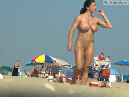 Witness unforgettable beach boobs by the shore - uninhibited pleasure awaits