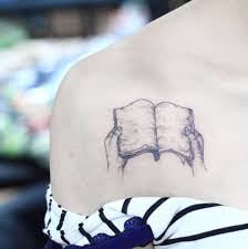 Elephant tattoo designs can also portray in different poses or scenarios. 40 Amazing Book Tattoos For Literary Lovers Tattooblend