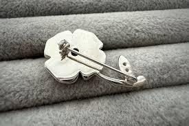 silver poppy brooch