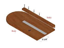 Use a hammer to vigorously pound all four edges of the inside of the frame, yes your hammering the mortar into all edges to eliminate any voids. Halloween Decoration How To Make A Wooden Tombstone How Tos Diy