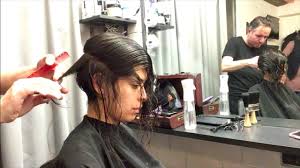 Women with curls can embrace the natural body of their hair with an inverted bob. Cutting A Graduated Bob Haircut On Curly Hair Youtube