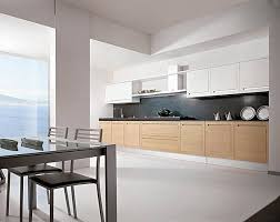 The color used here takes on a muted tone when paired with a dark wood backdrop and simple hardware. Pinterest Modern Black And White Kitchen Novocom Top