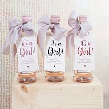 Also, if you look closely at the bottom right corner, you see we have bundles of shaving cream with a razor attached. These Diy Baby Shower Mini Wine Favors Are Just Too Cute