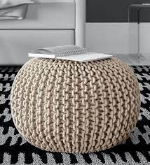 A useful and versatile item of furniture, ottomans and footstools can be used in many areas around the home. Buy Romania Knitted Pouffe In Beige Colour By Riance Creations Online Solid Color Pouffes Seating Furniture Pepperfry Product