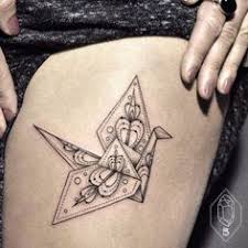 The completely assembled unit is pretty but needs some help in staying together. 22 Best Origami Tattoo Ideas 2017 Origami Tattoo Tattoos Tattoo Designs