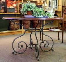 The table comes with one 20 leaf. Ethan Allen Round Dining Table W Iron Base 495 Round Dining Table Dining Table Table