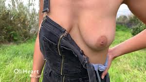 Hot girl walks braless in the jungle