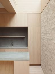 This Renovated Home Focuses On Keeping An Open Floor Plan That Includes The Garden Wood Paneled Floors And Walls Ar Minimalist Kitchen Interior Kitchen Design