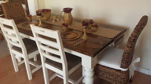 James James Baluster Dining Table With Banana Leaf Dining Chairs And Reclaimed Recycled Wood La Baluster Dining Table Craftsman Dining Tables Dream Dining Room