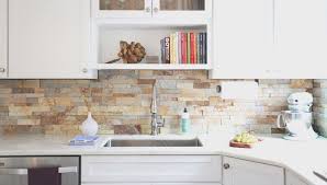 Orange And Pale Brown Stacked Stone Backsplash Near White Cabinets And A Matc In 2020 Contemporary Kitchen Backsplash Stacked Stone Backsplash Stone Backsplash Kitchen