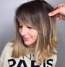 Check out the hottest celebrity styles and master the latest looks for mid length see the hottest new haircuts for medium length hair, from lauren conrad's long bob (known in hollywood as the lob) to taylor swift's medium crop. 50 Medium Haircuts For Women That Ll Be Huge In 2021 Hair Adviser