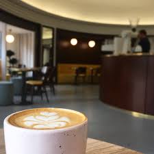 Horizont Is A Beautiful Art Deco Style Cafe In Budapest With Hip Food And Coffee Food Coffee Cafe Speciality Coffee