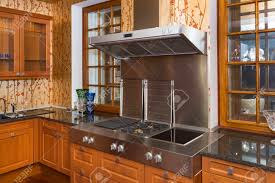 Photo about art nouveau kitchen interior with stove for cooking and cabinets for decoration. Art Nouveau Kitchen Interior With Stove For Cooking And Cabinets Stock Photo Picture And Royalty Free Image Image 145482750