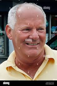 In this June 6, 2013 photo, Stephen Rakes is shown outside the liquor store  he once owned in the South Boston neighborhood of Boston. Authorities  Friday, Aug. 2, 2013 charged William Camuti,