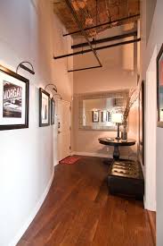 In this second example, the loft space is used beyond just a notice the use of the curved loft stairs that minimizes the use of any valuable floor small loft house design #6. West Loop Loft By Besch Design Homeadore