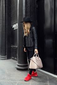 How To Look Chic In Sneakers With Lisa Olsson Glam Radar Sneaker Outfits Women Red Shoes Outfit Red Sneakers Outfit