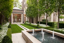 Mosaic beige retaining wall with mossy fieldstone on both sides of the waterfall. 24 Best Outdoor Fountains Luxury Garden Fountain Ideas