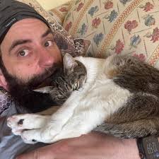 My comfortable cat, can I be that comfortable? Added some more pictures