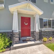 All items are in stock. Piched Roof Over The Vivid Red Front Door With Pillars And Railing On Both Sides Stock Image Image Of Entrance Residence 164000345