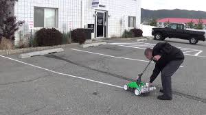 Our pavement marking tape is designed to mark asphalt or concrete parking lots. Striping Your Parking Lot For Cheap Youtube