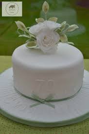 So, you want to make sure the text reflects the personality or retirement plans of the retiree best. 70th Birthday Cake With White Sugar Roses Bakeoftheweek Casa Costello