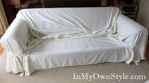 How To Cover A Chair Or Sofa With A Loose Fit Slipcover Sofa Throw Cover White Couch Cover Slipcovers For Chairs